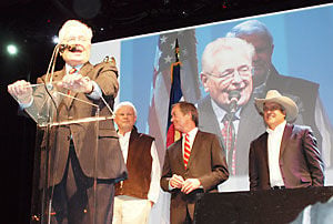 Inaugural party features boots, bolos and barbecue