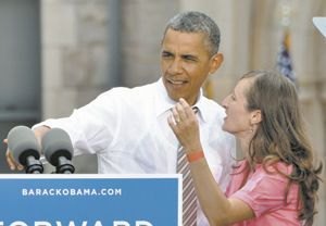 Obama encircled by Romney campaign in Springs