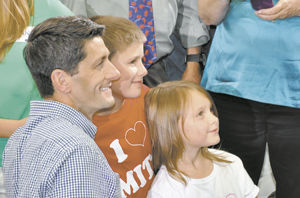 Ryan pick elicits cheers and jeers
