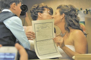 Partners say ‘we do’ after civil unions legislation becomes a reality