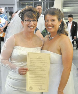 Partners say ‘we do’ after civil unions legislation becomes a reality
