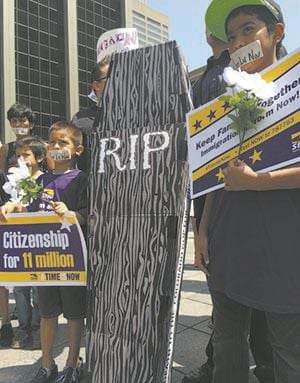 Beauprez clarifies controversial comments on immigration; SEIU, Latino leaders stage mock funeral