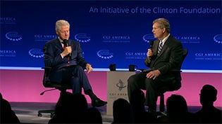 Big Dog leaves mark at Clinton Global summit in Denver