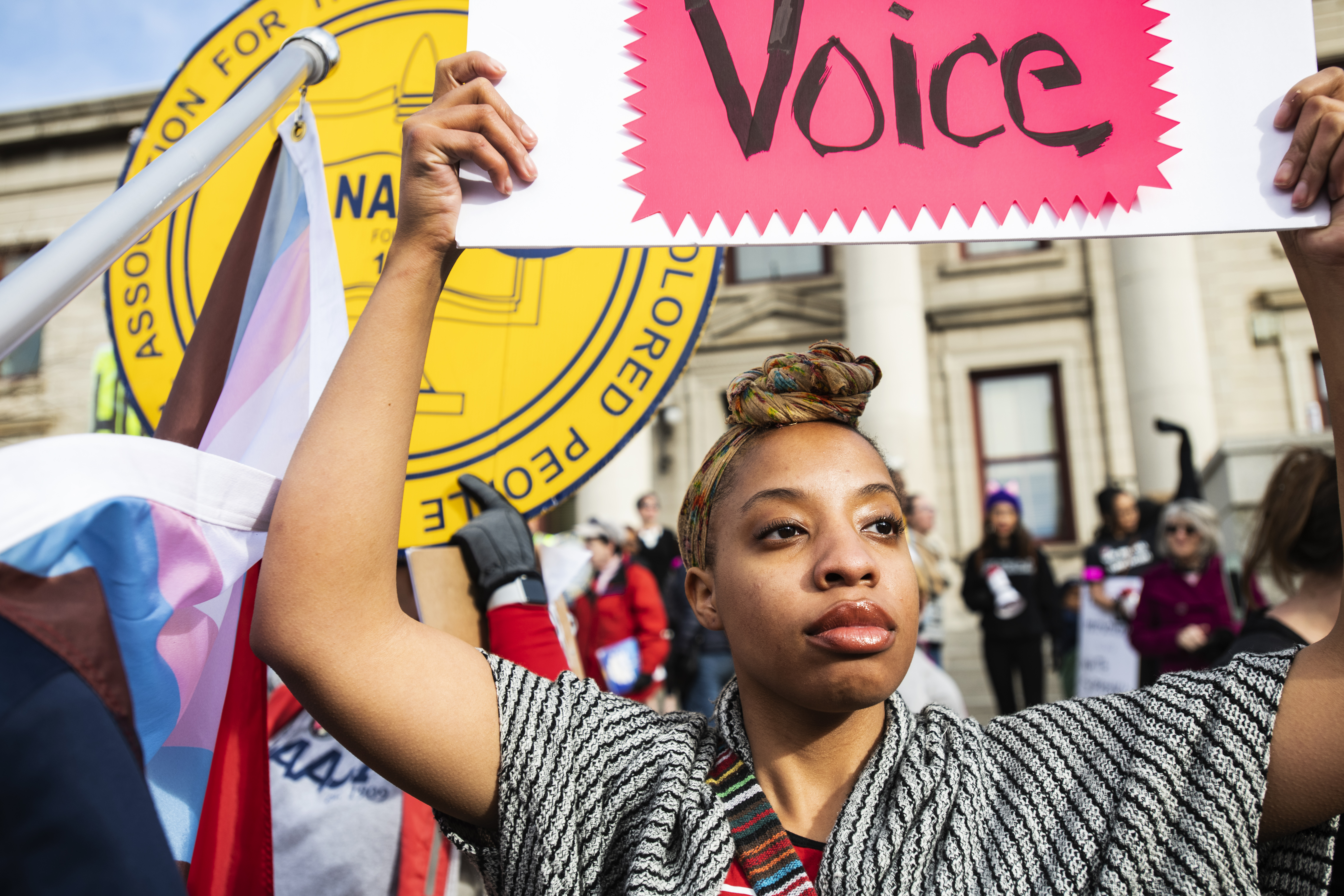 Darien Jackson holds a sign as she joins the Womxn's March in Colorado Springs, Saturday, Jan. 19, 2019. This was Jackson's first year at the march. (Photo by Kelsey Brunner/The Gazette) (Kelsey Brunner)
