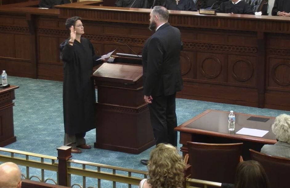 Monica Marquez swears in Eric Kuhn