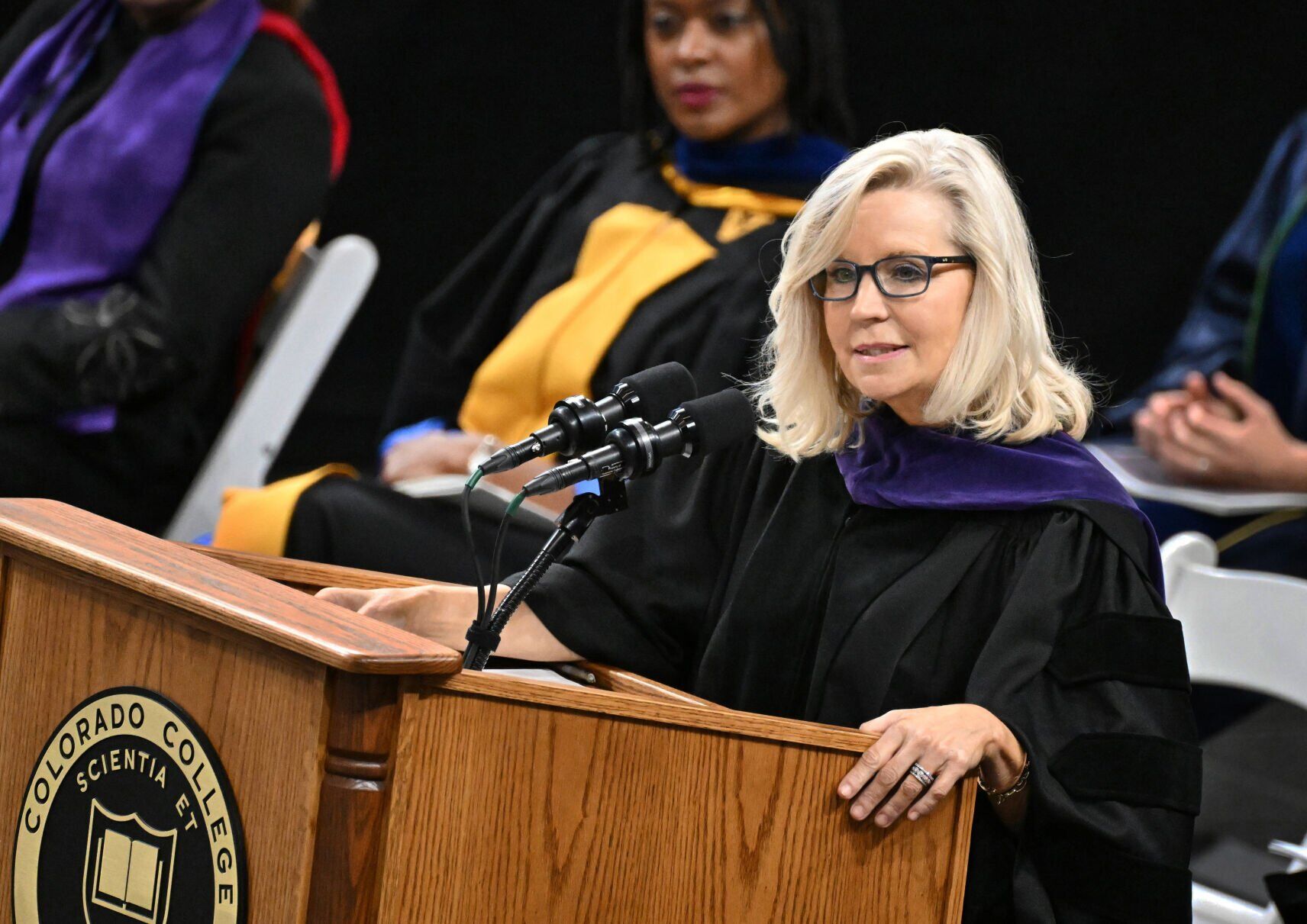 Colorado College alum Liz Cheney delivers commencement speech; graduates turn chairs away from stage in protest