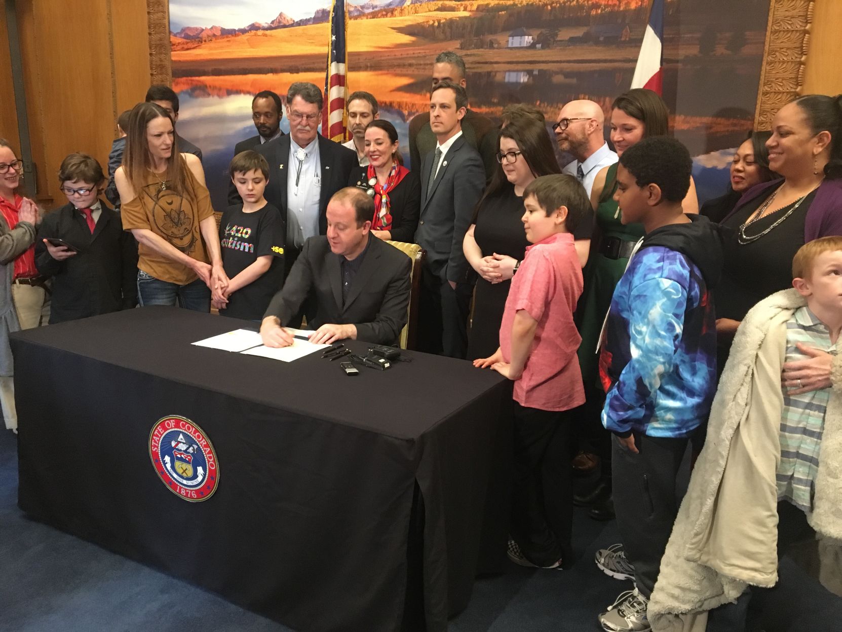 Polis signs bill allowing marijuana for child autism treatment
