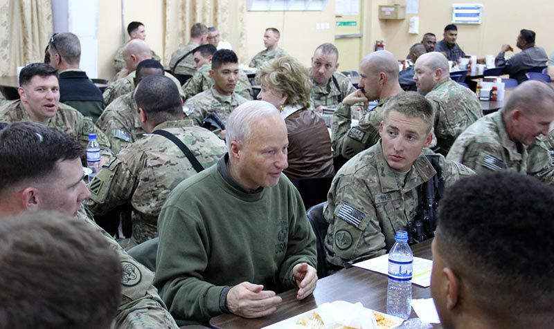 U.S. Rep. Mike Coffman celebrating Christmas in Afghanistan with deployed troops