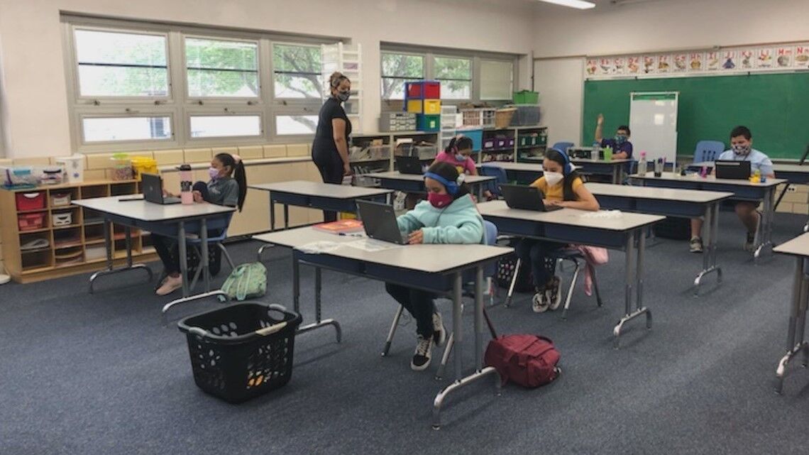 COVID-19 cases rise as students return to school in Denver