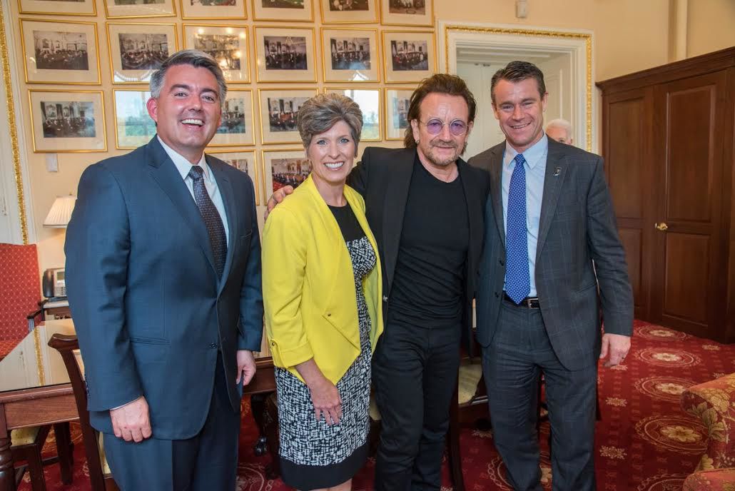 In the name of love (and business): Gardner stands with Bono on global poverty