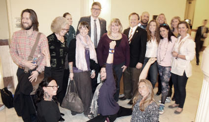 Garnett outsources, Hill wins lawmakers’ yoga feud