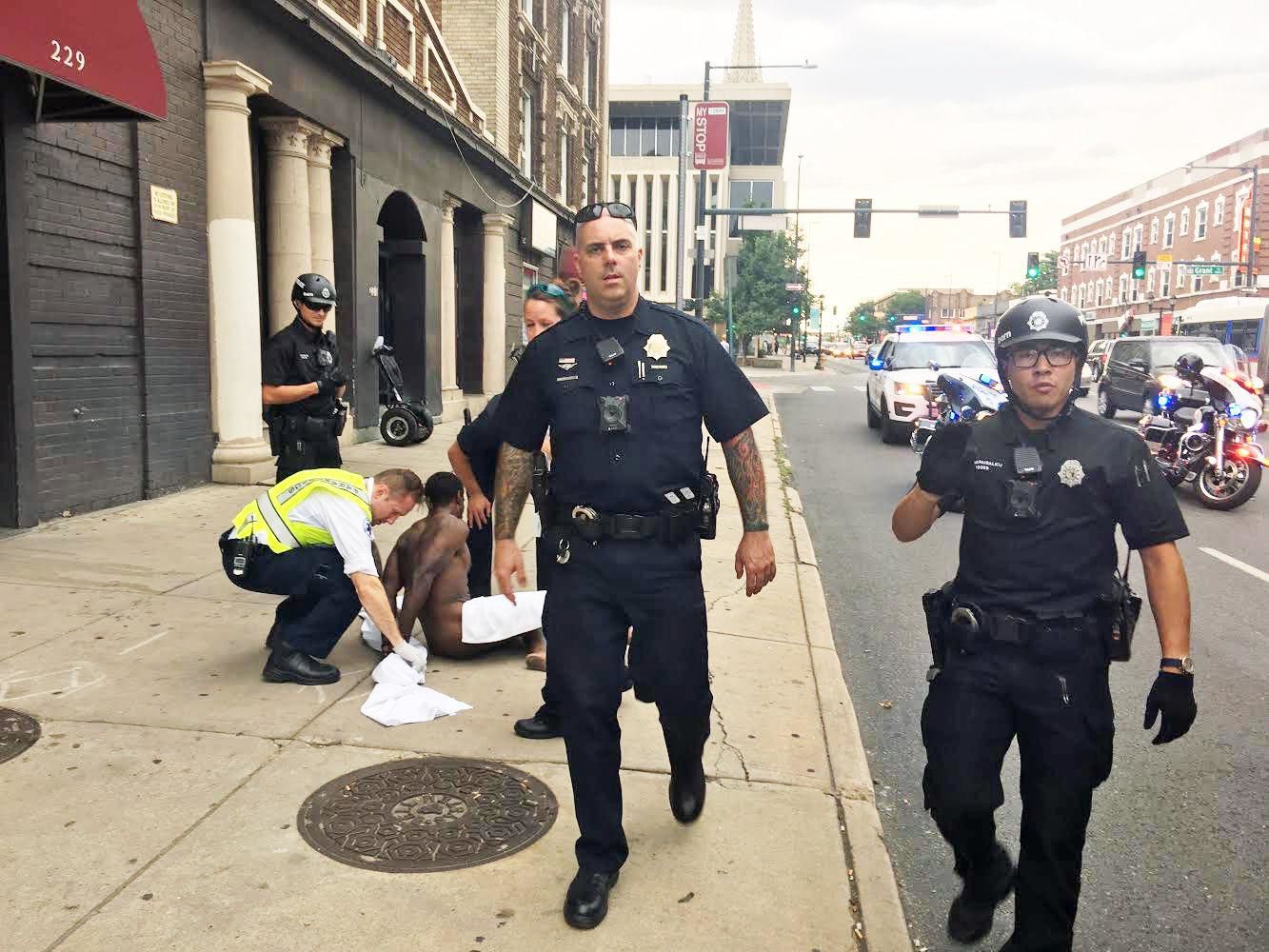 Denver police: Officers violated policy by cuffing journalist (VIDEO)