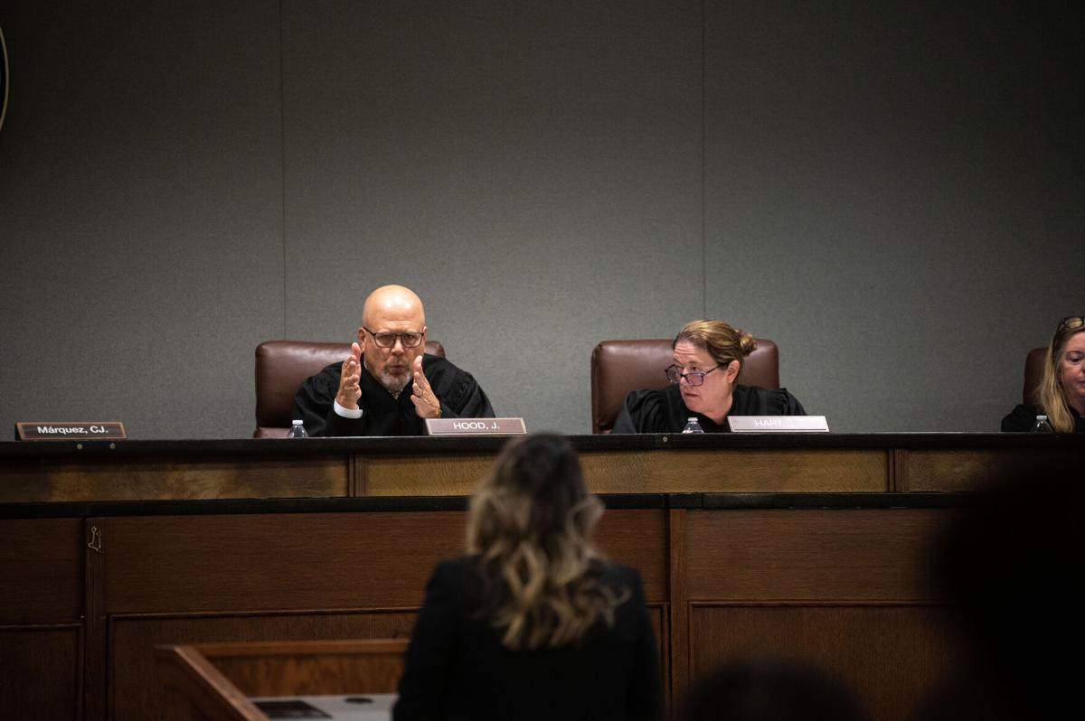 Justices Will Hood and Melissa Hart