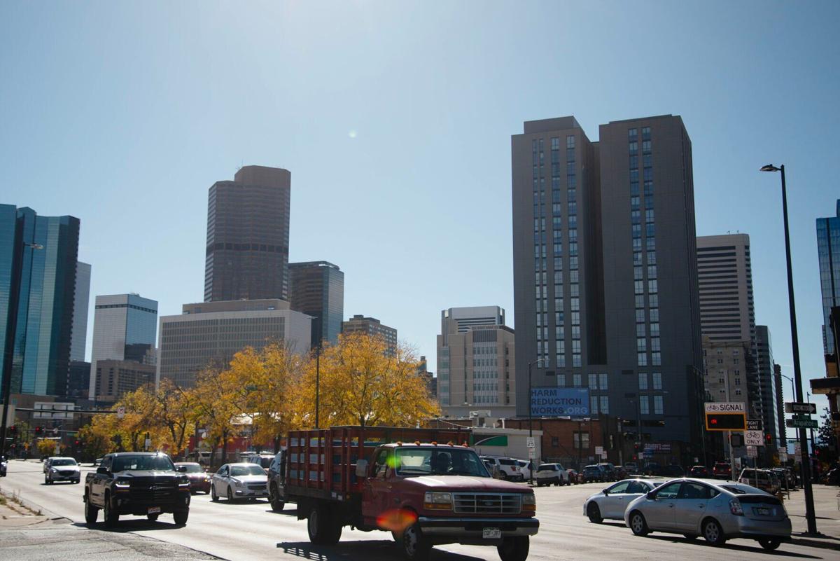Vehicles pass through downtown Denver (copy)
