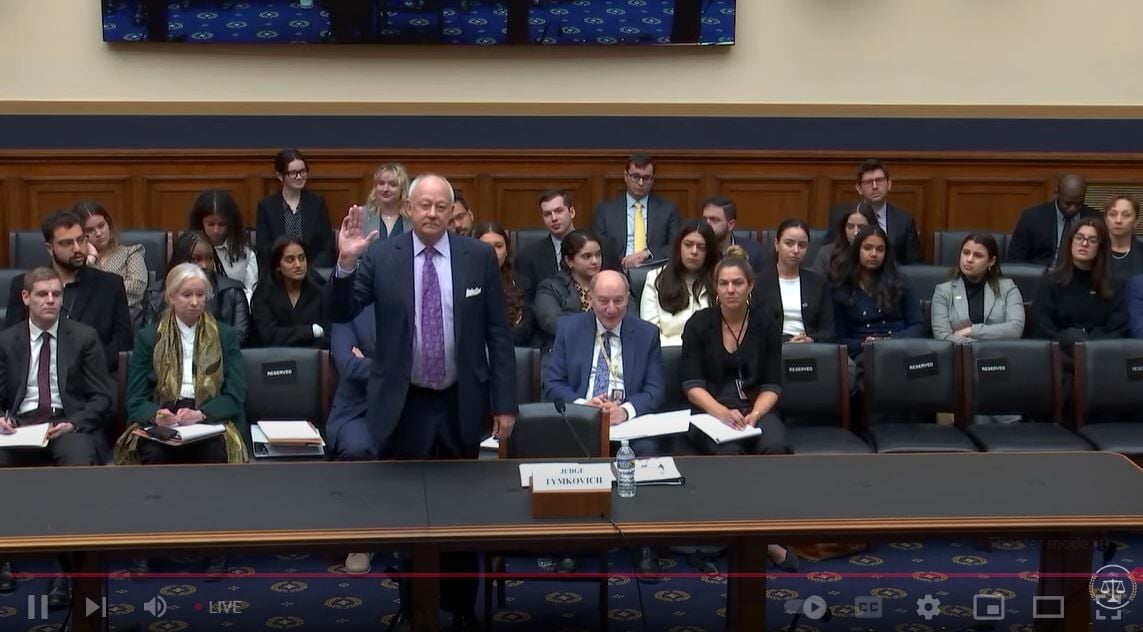 Judge Tim Tymkovich sworn in prior to testimony