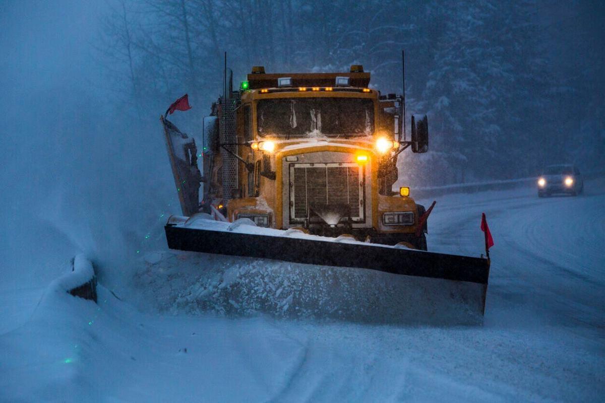 Snowplow plowing the highway during snow storm. Photo Credit: VisualCommunications (iStock).