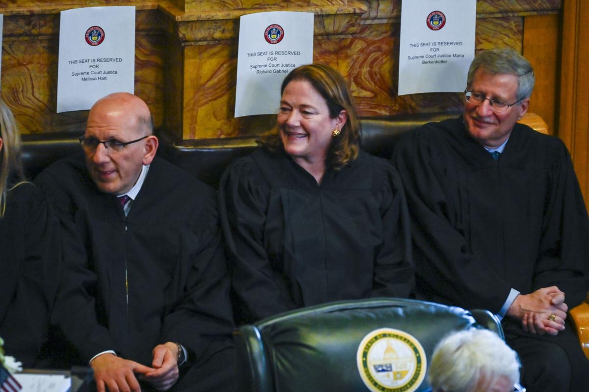 Justices Carlos Samour, Melissa Hart, Rich Gabriel