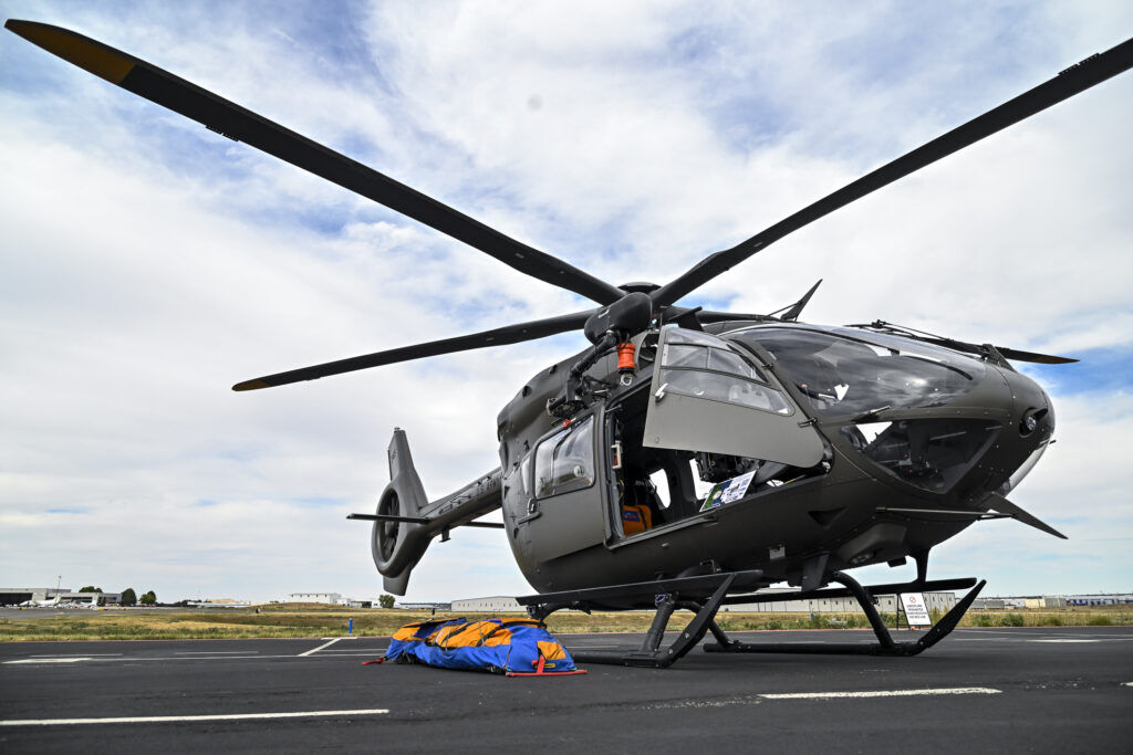 a static display of a small military helicopter