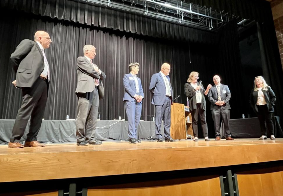 Members of the Colorado Supreme Court during a “Courts in the Community” visit to Falcon High School in Peyton on May 15, 2025. From left to right: Justices Carlos A. Samour Jr. and Richard L. Gabriel, Chief Justice Monica M. Márquez, and Justices William W. Hood III, Melissa Hart, Brian D. Boatright and Maria E. Berkenkotter. (Photo by Michael Karlik)