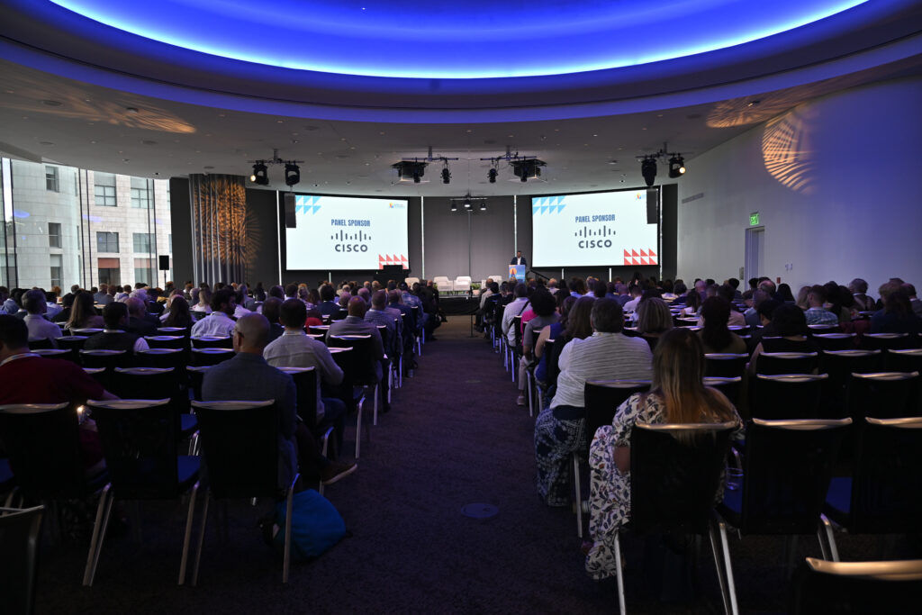 a wide view of a stage in a large conference room