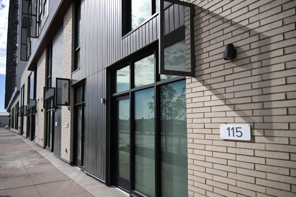 the exterior of a new apartment builing