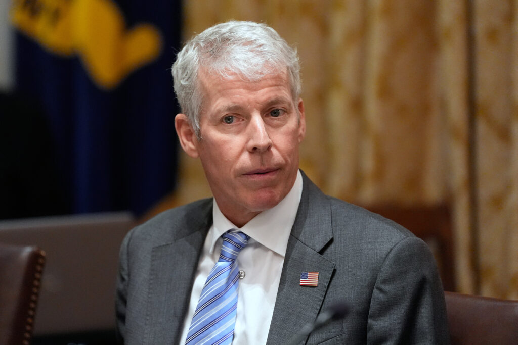 Energy Secretary Chris Wright listens as President Donald Trump meets with Argentina's President Javier Milei in the Cabinet Room of the White House, Tuesday, Oct. 14, 2025, in Washington. (AP Photo/Alex Brandon)