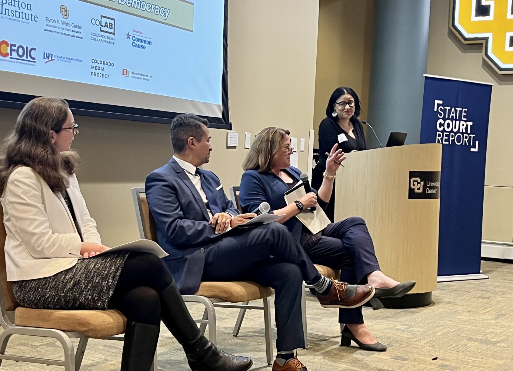 A discussion about the Colorado and U.S. constitutions at the University of Colorado in downtown Denver on Oct. 12. From left to right are Alicia Bannon of the Brennan Center for Justice, Tom Romero of the University of Denver’s law school, Justice Melissa Hart and moderator Chandra Thomas Whitfield of CPR. (Photo by Michael Karlik/Colorado Politics)