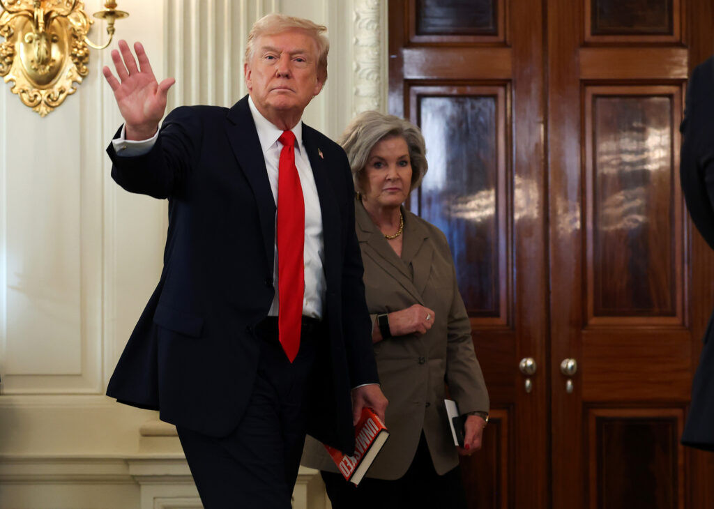 U.S. President Donald Trump, left, departs with White House Chief of Staff Susie Wiles following a roundtable discussion in the State Dining Room of the White House on Oct. 8, 2025, in Washington, D.C. (Anna Moneymaker/Getty Images/TNS)