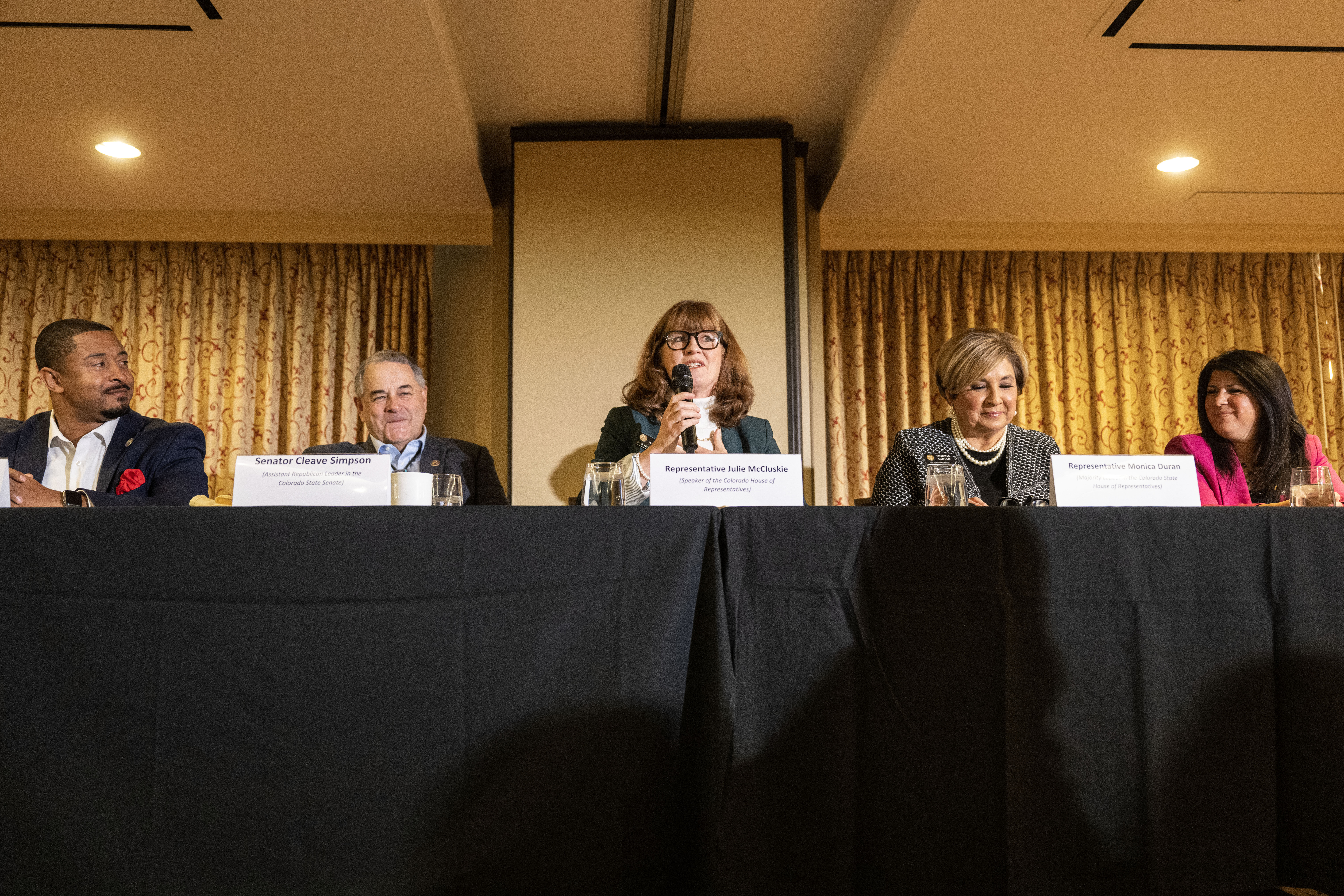 Colorado Legislators, from left, Sen. James Coleman, D-Denver, Senator Cleave Simpson, R-District 6, Representative Julie McClusky, D-Summit County, Representative Monica Duran, D-Jefferson County, and Representative Rose Pugliese, R-Colorado Springs, discuss issues during a Legislative Forum in Denver on Wednesday, Dec. 4, 2024. (Stephen Swofford, Denver Gazette) (Stephen Swofford/ Denver Gazette)