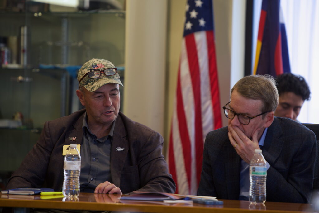 Bob McLaughlin and Sen. Michael Bennet discuss challenges associated with caring for veterans in the Pikes Peak Region. Bennet stopped at the Mt. Carmel Veterans Service Center in Colorado Springs to help shape his policy around veteran care if elected governor. 