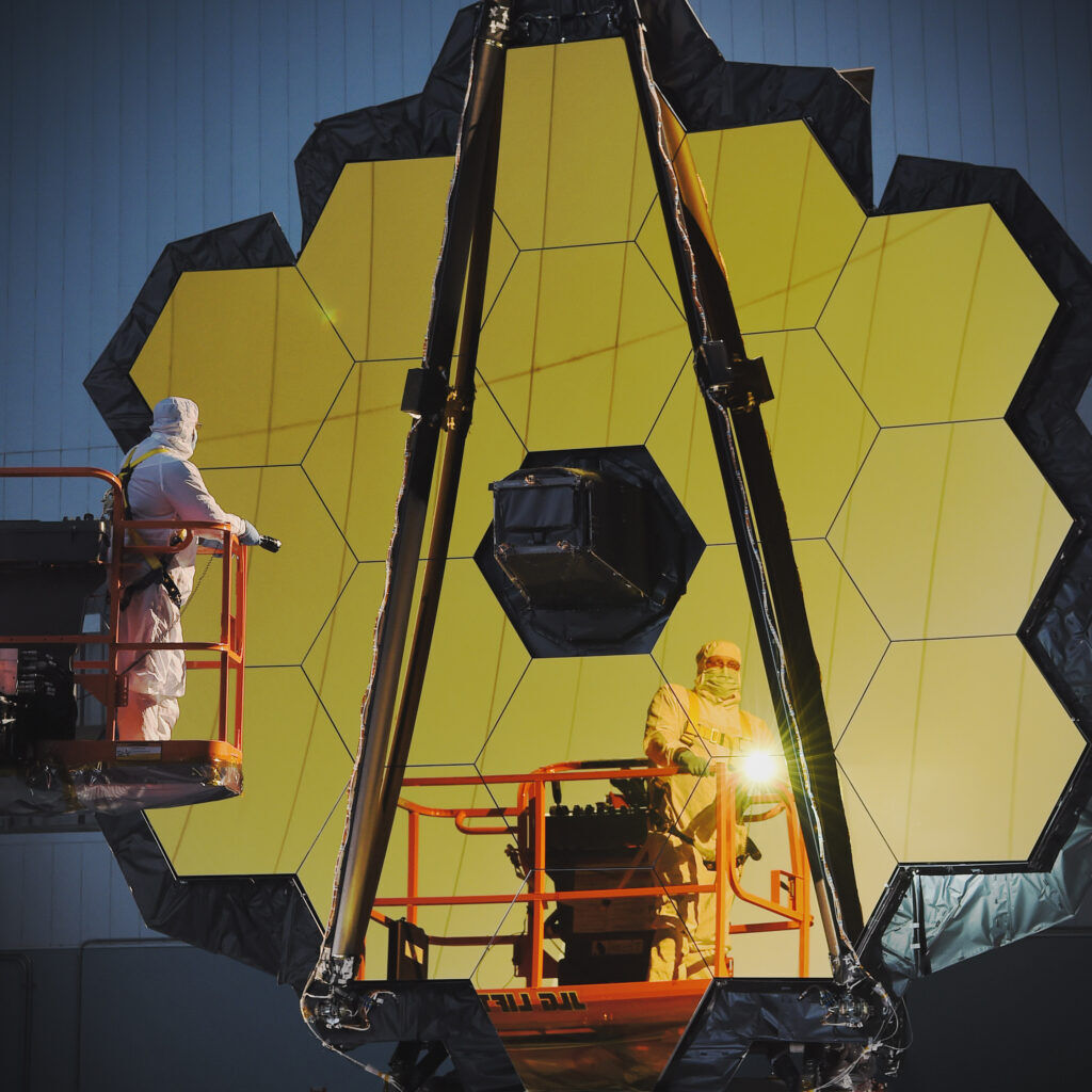 A space telescope's primary mirror is tested while on the ground in Florida. 