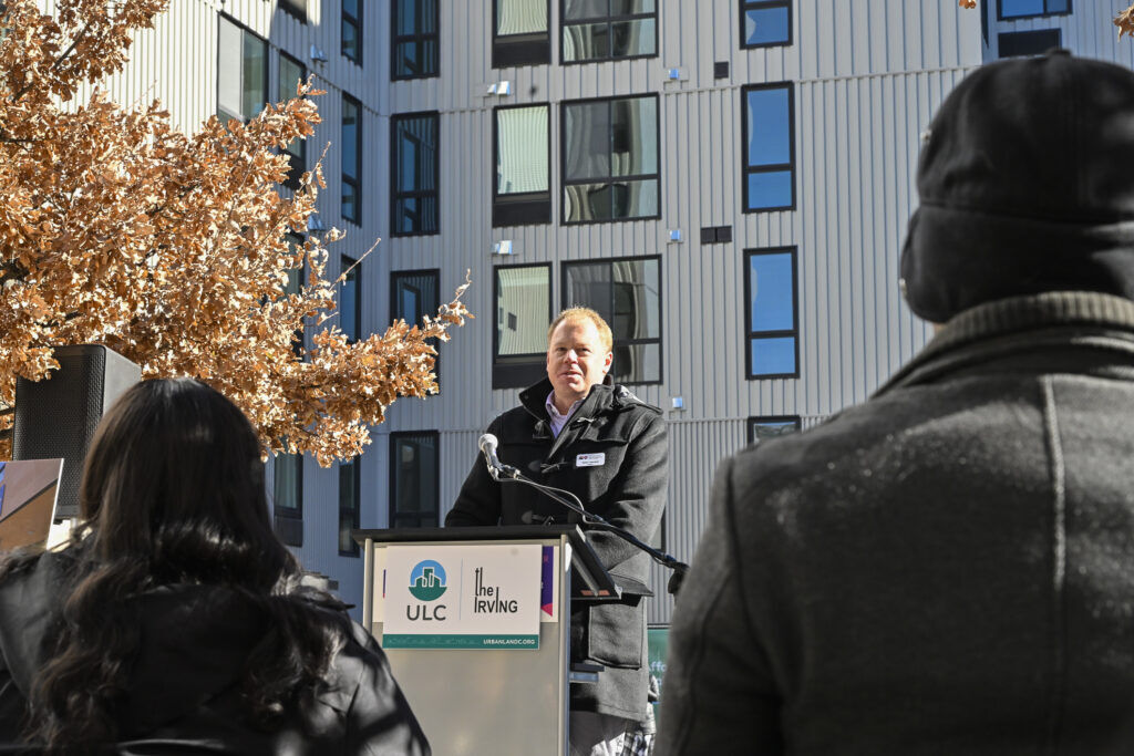 a man behind a podium