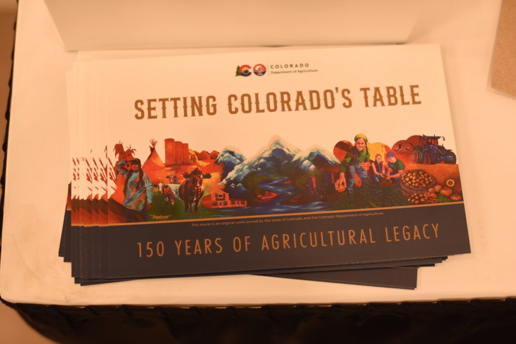 Postcards depicting a mural on them