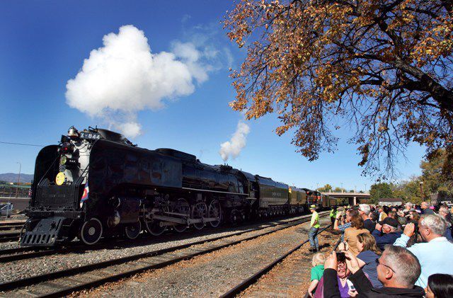 The Union Pacific No. 844 steam locomotive arrives for its Colorado Springs stop on the New Mexico/Arizona Centennial Tour in downtown Colorado Springs on Sunday, Oct. 30. Hundreds of rail buffs and spectators turned out to see No. 844 during the steamer's run across nine states. The train will be on display Monday from 9 a.m. to 5 p.m. before traveling to Pueblo Tuesday morning. Photo by Mike Christy, The Gazette