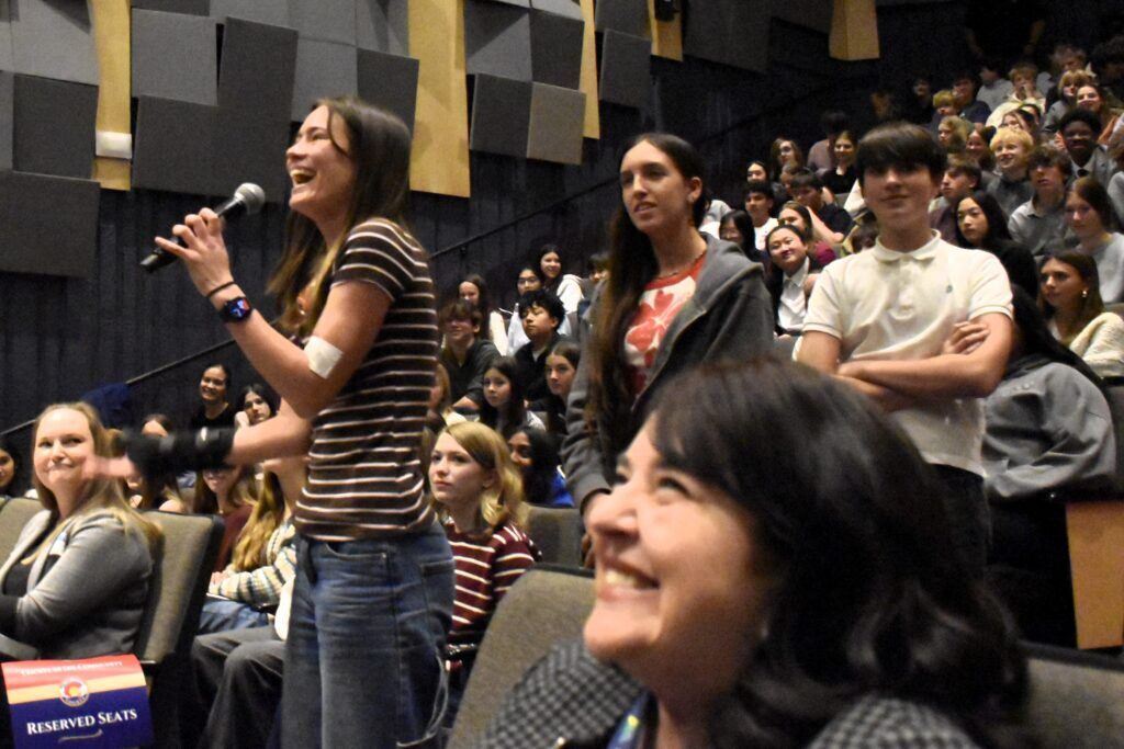 Fairview High School senior Portia Richards asks a question of the appellate court judges participating in the Colorado Judicial Department’s Courts in the Community outreach program on Tuesday, Feb. 24, 2026 at Fairview High School in Boulder. Amy Bounds, pool via Prairie Mountain Media.
