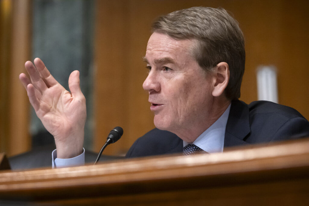Sen. Michael Bennet, D-Colo., speaks during a hearing of the Senate Committee on Finance on Capitol Hill, Thursday, March 6, 2025, in Washington. (AP Photo/Mark Schiefelbein)