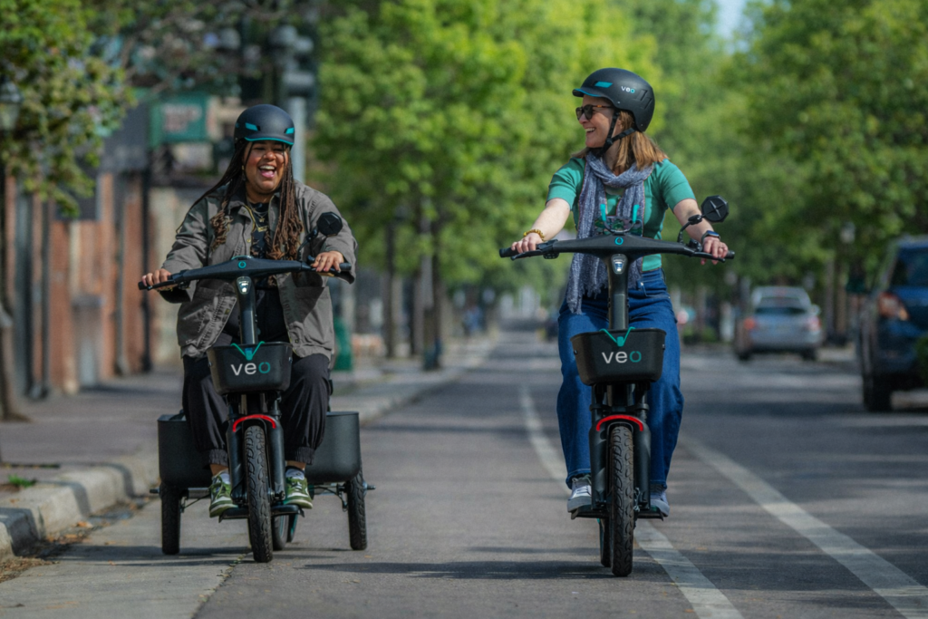 two women rising e-bikes