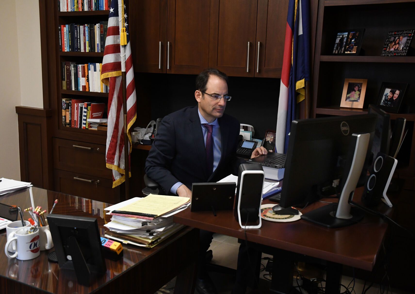 FILE PHOTO: Colorado Attorney General Phil Weiser inside his office at the Ralph L. Carr Colorado Judicial Center in Denver.