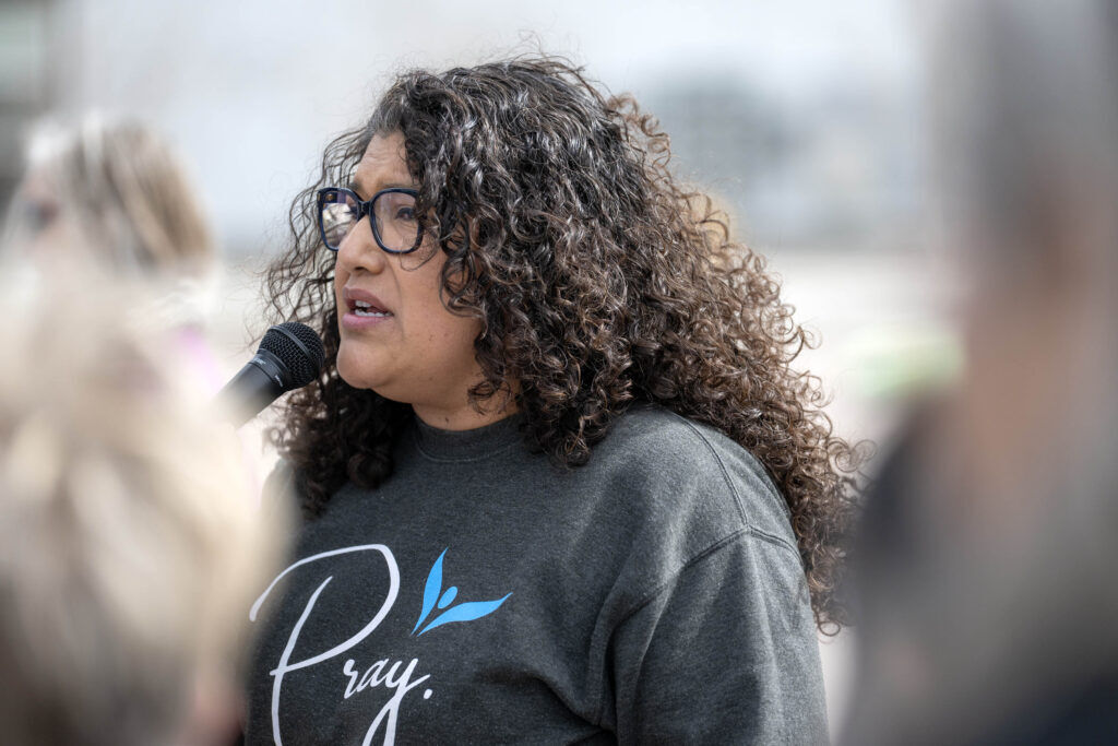 Ramona Treviño speaks to a small crowd during an anti abortion vigil organized by 40 Days for Life on Centennial Blvd near Planned Parenthood – Westside Health Center in Colorado Springs on Thursday, March 12, 2026. (The Gazette, Michael G. Seamans)