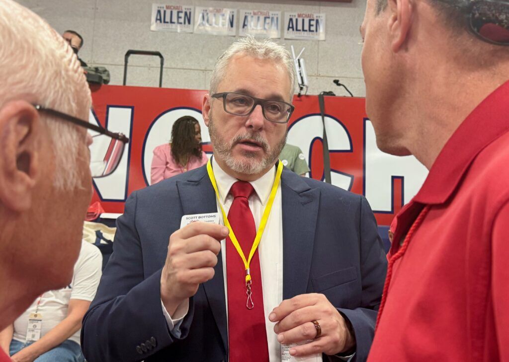Republican gubernatorial candidate state Rep. Scott Bottoms, R-Colorado Springs, speaks with delegates at the Colorado GOP's state assembly on Saturday, April 11, 2026, at Massari Arena on the Colorado State University Pueblo campus in Pueblo. (Ernest Luning/Colorado Politics)