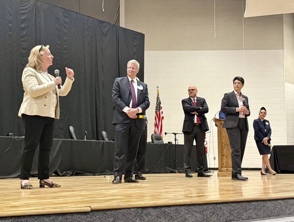 From left to right, Colorado Supreme Court Justices Maria E. Berkenkotter, Richard L. Gabriel, William W. Hood III, Chief Justice Monica M. Márquez, and Justice Susan Blanco address students at Holyoke Junior/Senior High School. The Supreme Court visited Holyoke, Colo. on April 16, 2026 as part of its "Courts in the Community" program.