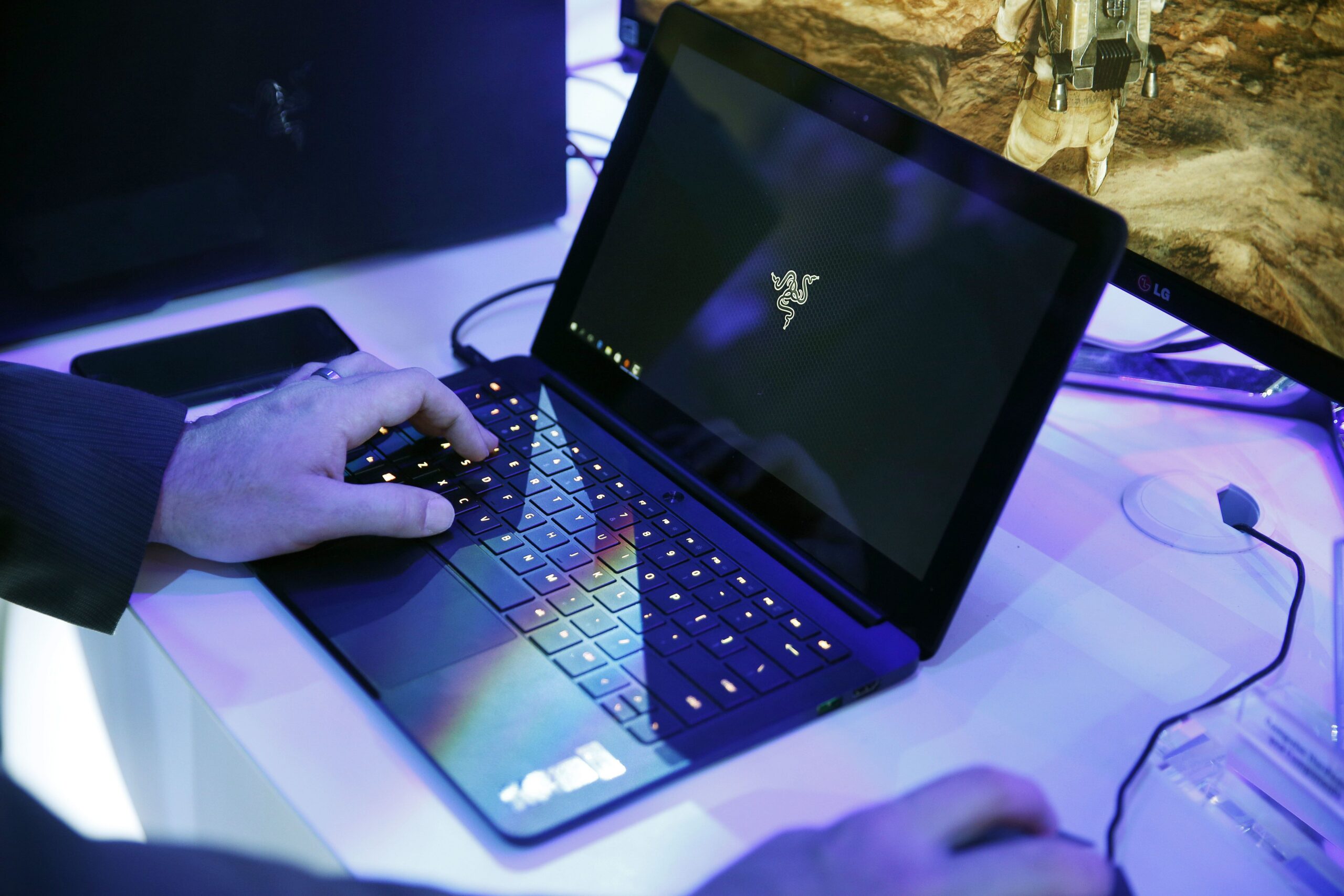FILE - In this Jan. 7, 2016 file photo, a laptop is seen in Las Vegas. Royal Jordanian Airlines is advising passengers that laptops, iPads, cameras and other electronics wonât be allowed in carry-on luggage for U.S.-bound flights starting Tuesday, March 21, 2017. (AP Photo/John Locher, File)