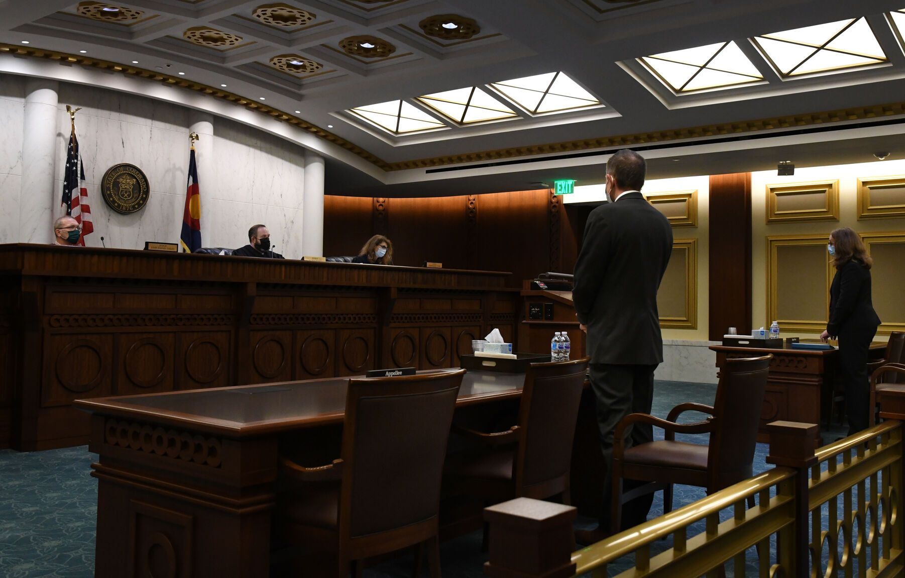 FILE PHOTO: A three-judge panel for the Colorado Court of Appeals prepares to hear a case on Oct. 26, 2021, in Denver.