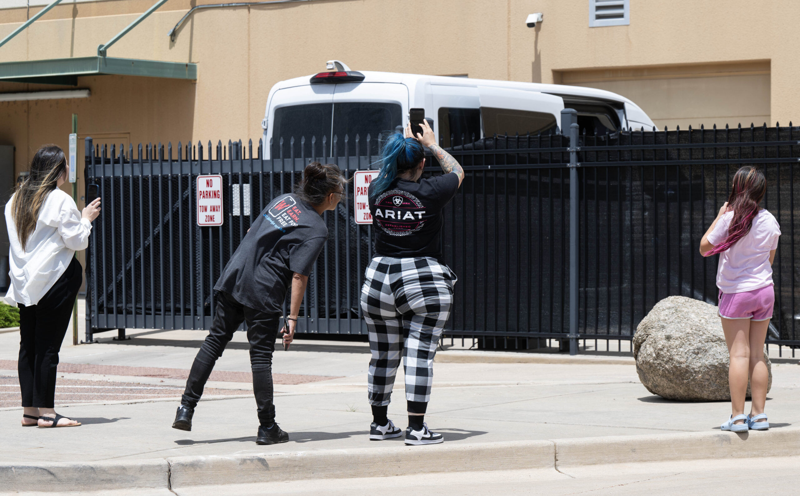 Shackled ICE detainees seen escorted from downtown Colorado Springs bank building