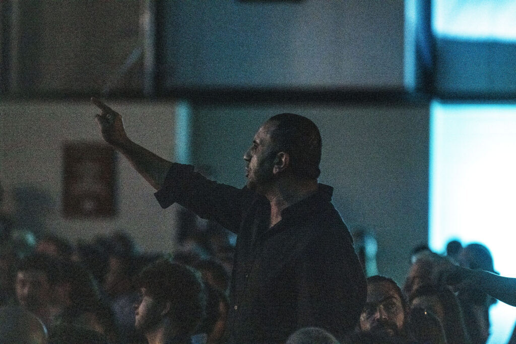 A protester begins shouting from his seat during Denver Mayor Mike Johnston’s state of the City address at the National Western Center on Tuesday, July 21, 2026.