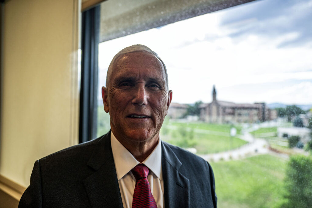 Former Vice President Mike Pence talks with a Colorado Politics reporter at Colorado Christian University in Lakewood on Thursday, July 30, 2026. (Stephen Swofford, Denver Gazette)