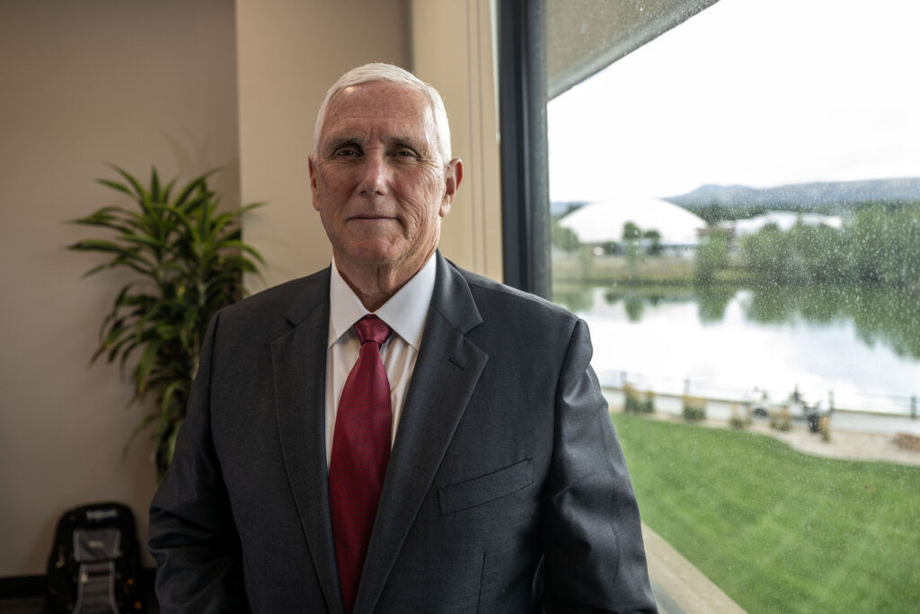 Former Vice President Mike Pence talks with a Colorado Politics reporter at Colorado Christian University in Lakewood on Thursday, July 30, 2026. (Stephen Swofford, Denver Gazette)