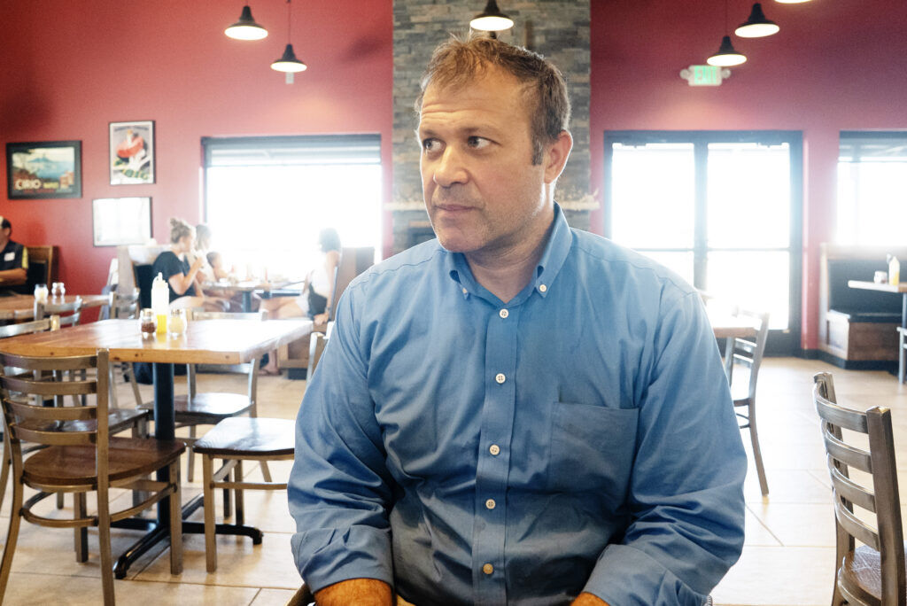 Ben Skoglund sits in his restaurant, Ben's Brick Oven Pizza, on Wednesday, July 15, 2026 in Hudson, Colo. (Tom Hellauer, Denver Gazette)