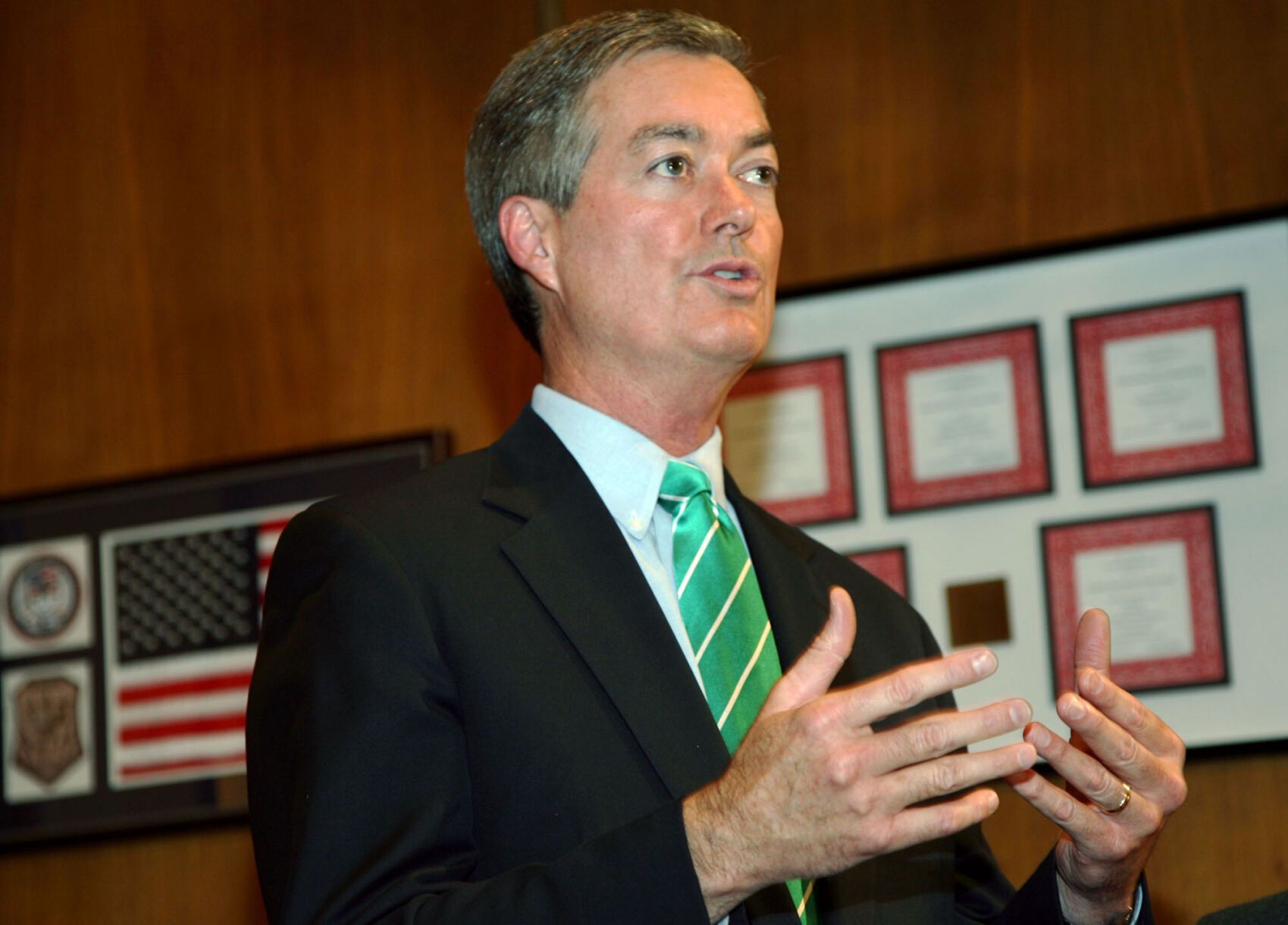 In this file photo, then-Colorado Gov. Bill Owens responds to questions during a news conference on June 28, 2006, in Denver, where the Republican announced he was calling a special session of the state legislature. (AP Photo/David Zalubowski, file)