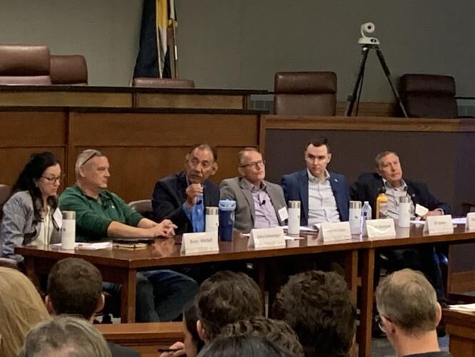 Six of the seven commissioners for the Colorado River, in an unprecedented public conversation on the future of the river at the 2024 conference at CU-Boulder on the Colorado River. From left to right: Becky Mitchell, Colorado; John Entsminger, Nevada; Estevan López, New Mexico; Gene Shawcroft, Utah; JB Hamby, California; Tom Buschatzke, Arizona. Wyoming state engineer Brandon Gebhart was absent due to illness. (Marianne Goodland, Colorado Politics)